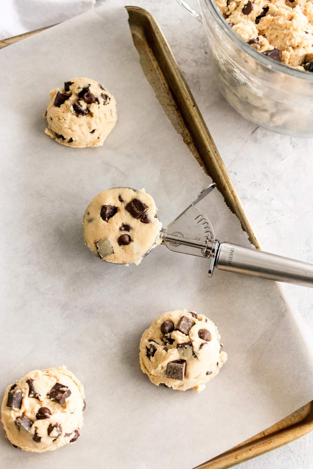 photo of the chocolate chip cookies being scooped by top Houston lifestyle blogger Ashley Rose of Sugar & Cloth