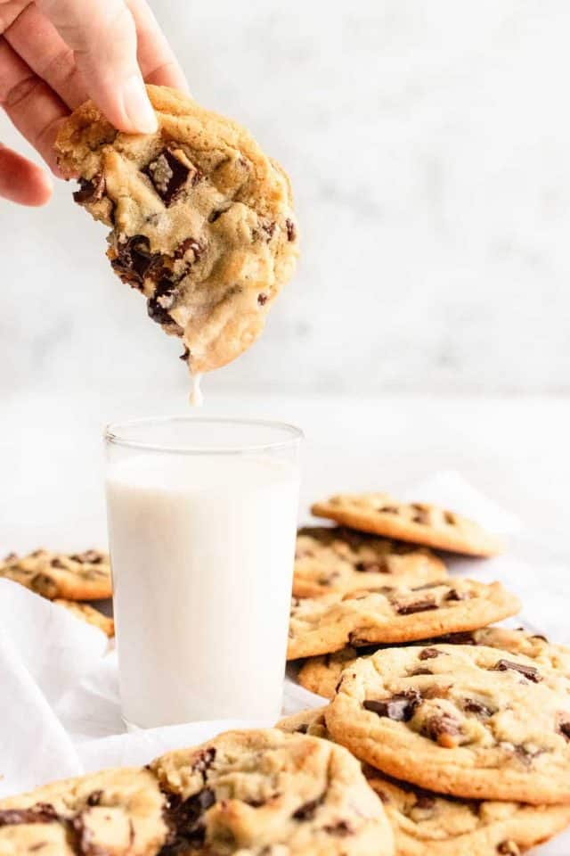 photo of the best chocolate chips being dipped in milk 