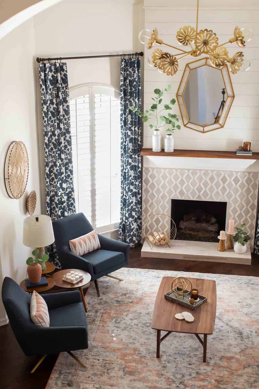 photo of the geometric mirror to turn a living room modern by top Houston lifestyle blogger Ashley Rose of Sugar & Cloth