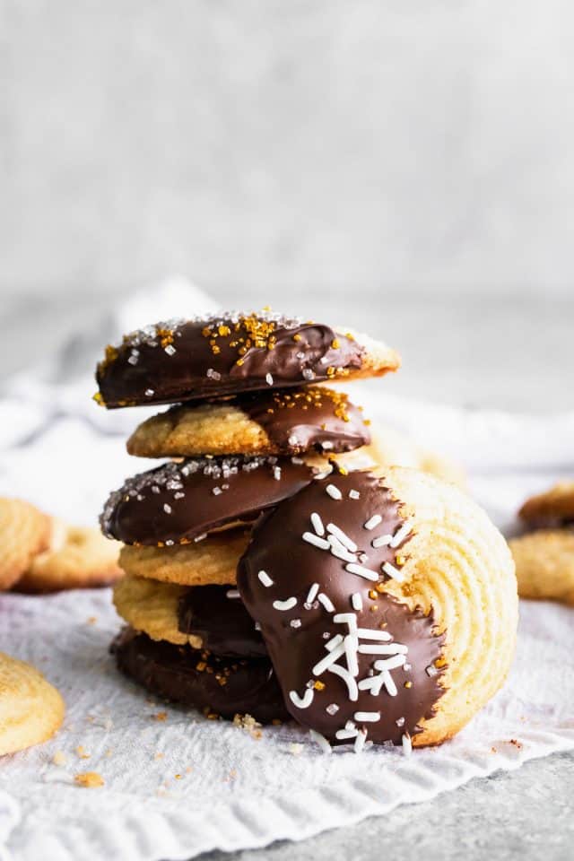 photo of the easy butter cookies stacked with chocolate and sprinkles by top Houston lifestyle blogger Ashley Rose of Sugar & Cloth