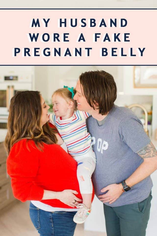 photo of a dad wearing a fake pregnant belly