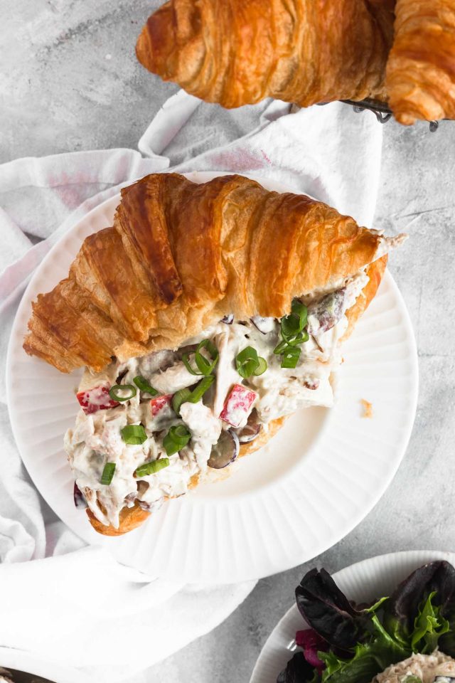The best chicken salad served as a croissant sandwich, photographed by Houston lifestyle blogger Ashley Rose of Sugar & Cloth.