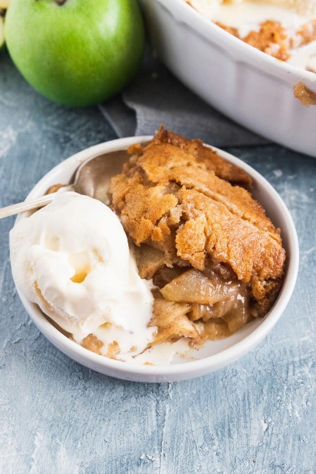 photo of the apple cobbler dessert with a scoop of ice cream by top Houston lifestyle blogger Ashley Rose of Sugar & Cloth