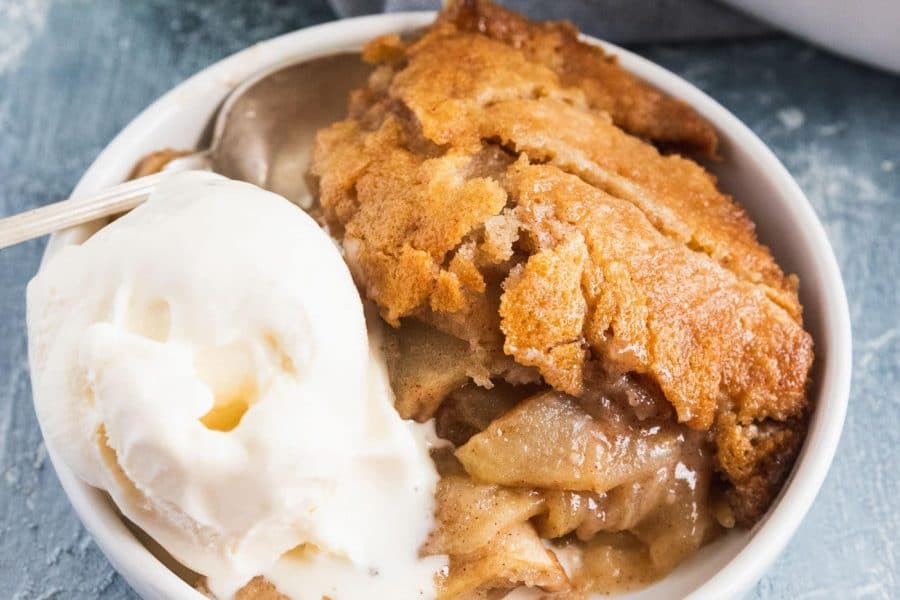 photo of the apple cobbler dessert with a scoop of ice cream by top Houston lifestyle blogger Ashley Rose of Sugar & Cloth
