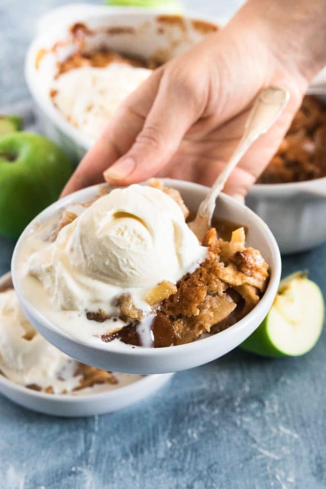 photo of an apple cobbler being served with ice cream by top Houston lifestyle blogger Ashley Rose of Sugar & Cloth