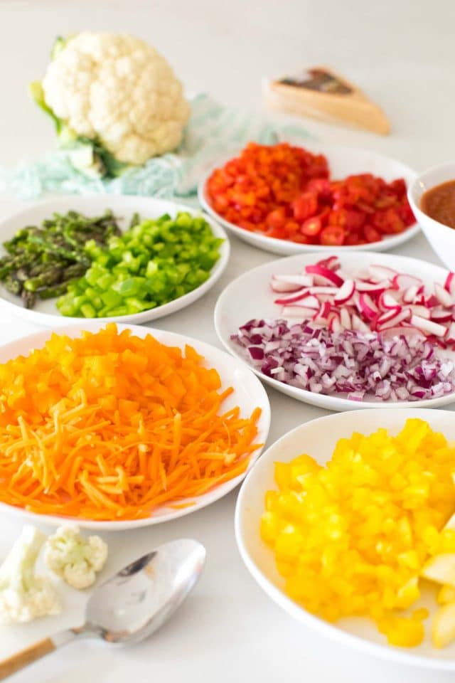 plates of rainbow veggie toppings