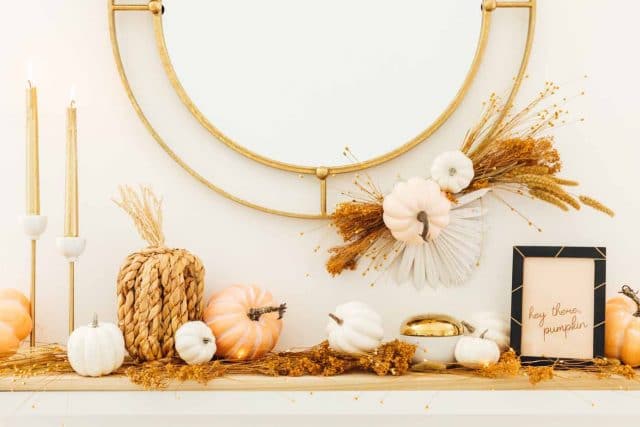 a fall mantle styled with pumpkins