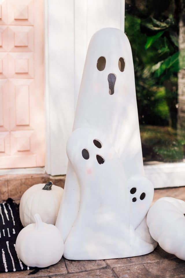 halloween ghost decorations with a pink door