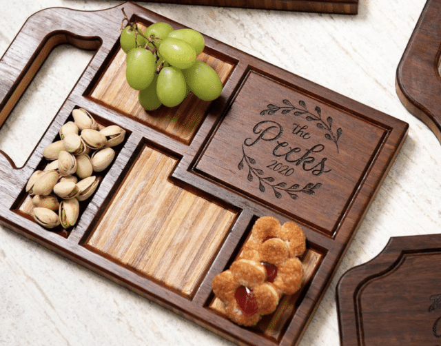 photo of a serving board with fruits and nuts and customized name plate - personalized christmas gift