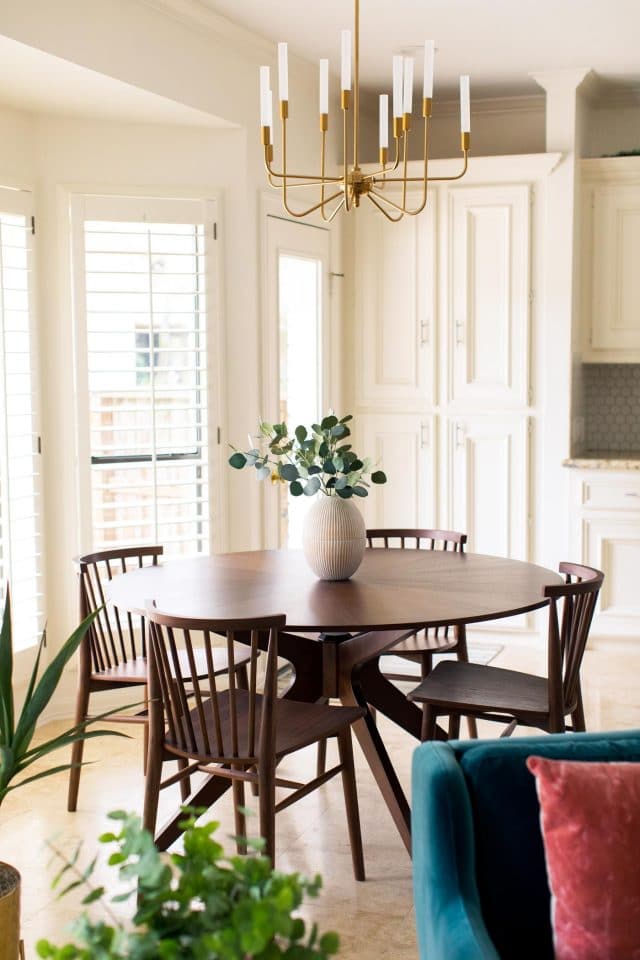 an angled look of a dining room table and chair