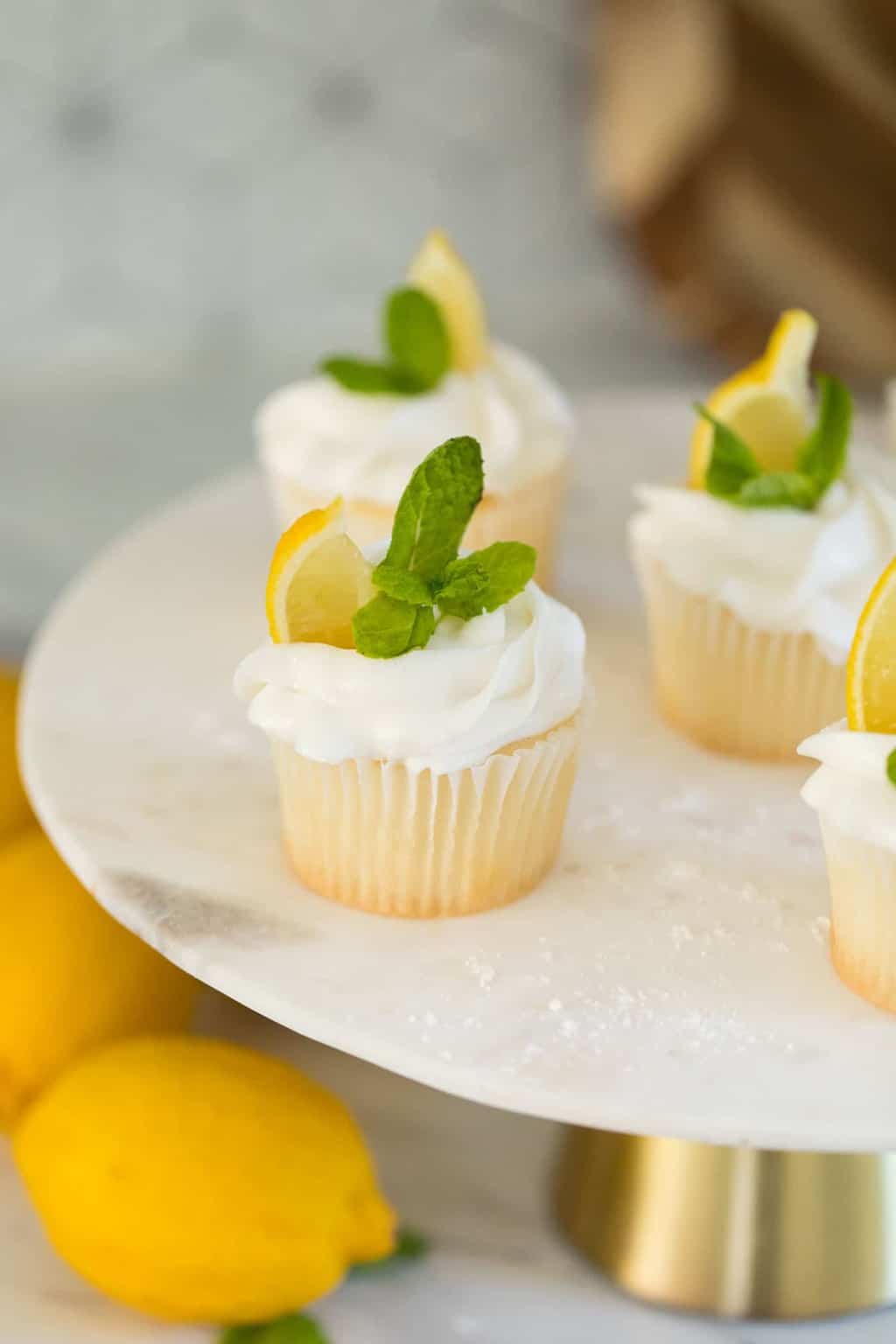 close up photo of the lemon cupcakes recipe by top Houston lifestyle blogger Ashley Rose of Sugar & Cloth