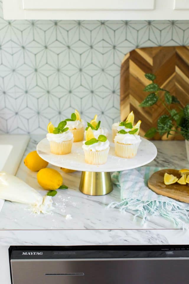 photo of lemon wedges and mint sprigs on lemon cupcakes by top Houston lifestyle blogger Ashley Rose of Sugar & Cloth