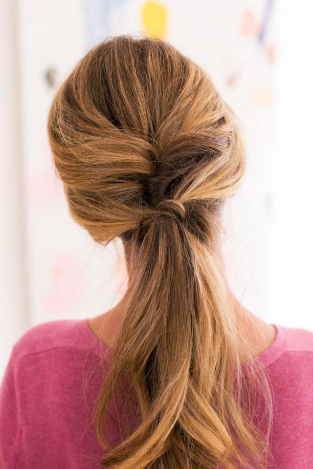 photo of a double low ponytail by top Houston lifestyle blogger Ashley Rose of Sugar & Cloth