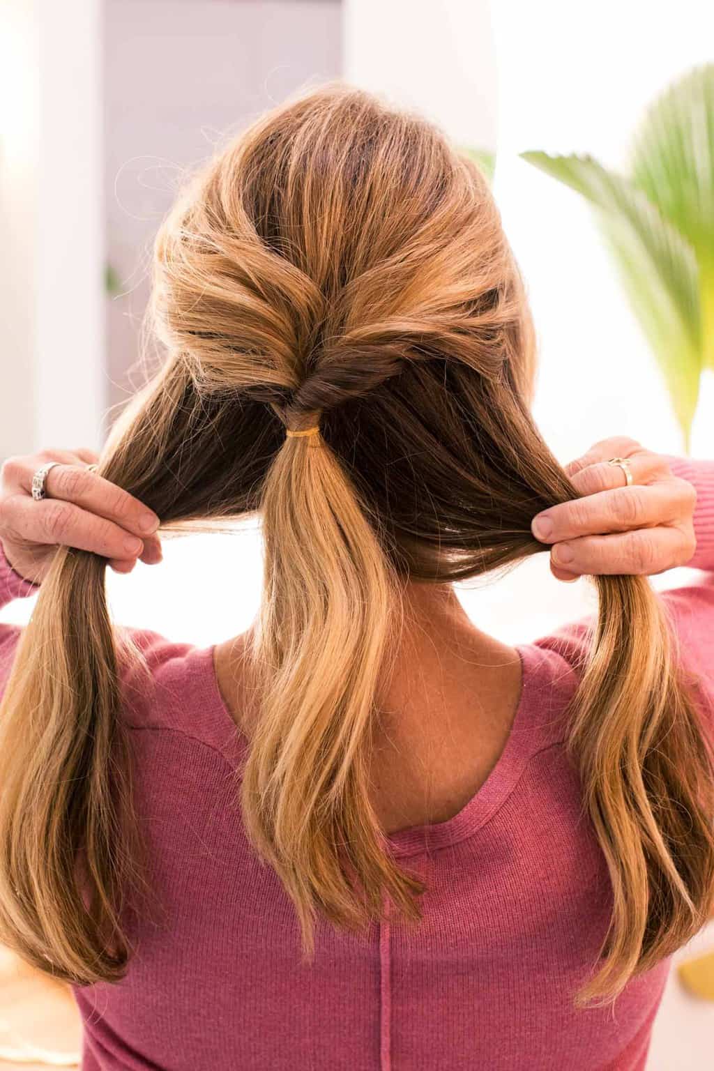 photo of how to style a double low ponytail by top Houston lifestyle blogger Ashley Rose of Sugar & Cloth