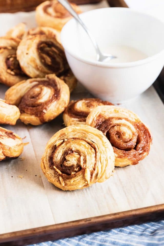 photo of the quick puff pastry cinnamon rolls hot out of the oven by top Houston lifestyle blogger Ashley Rose of Sugar & Cloth