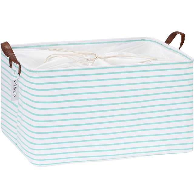 photo of the Mint Striped Collapsible Storage Bin as an Easter basket of kids by top Houston lifestyle blogger Ashley Rose of Sugar & Cloth