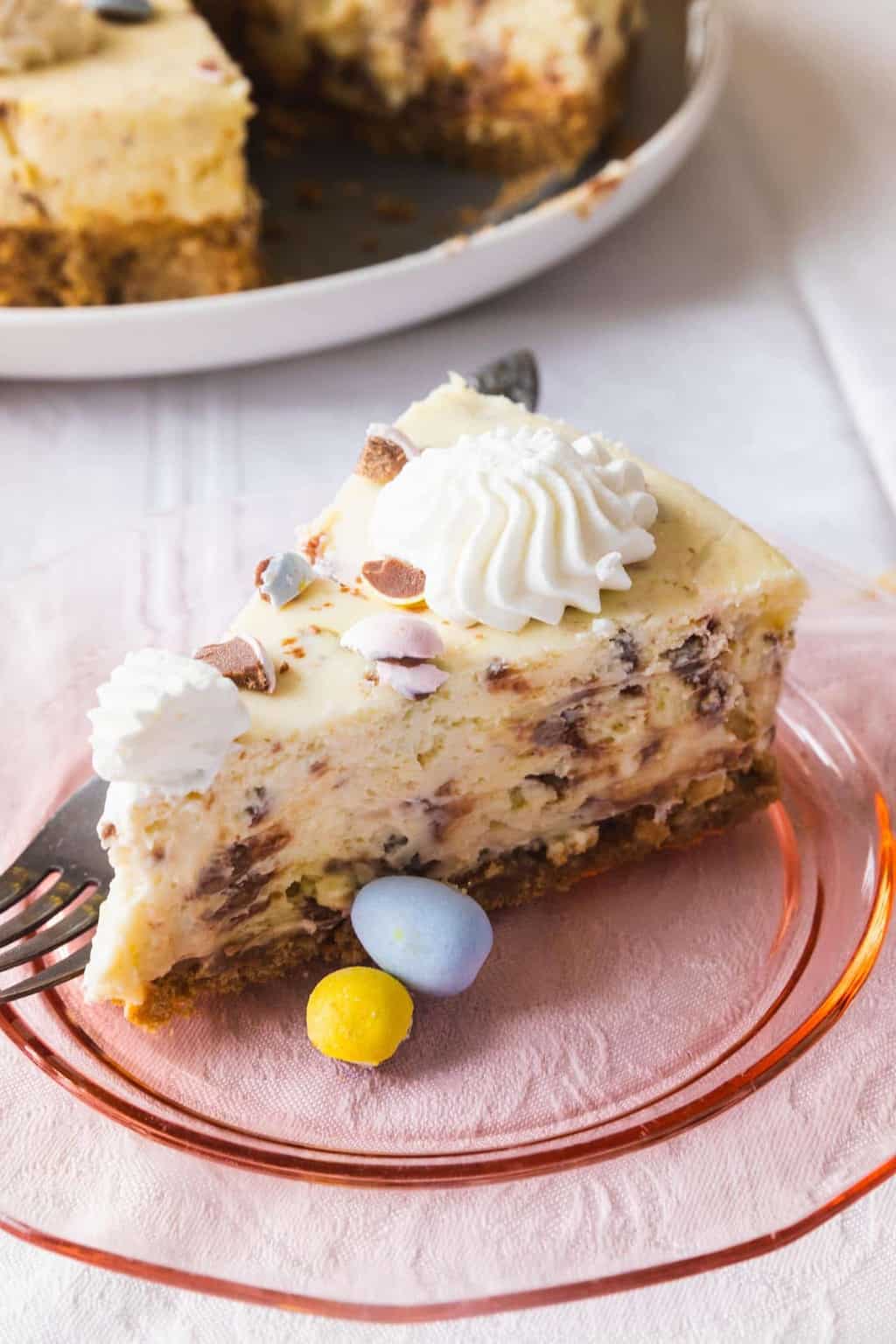 photo of a slice of mini egg cheesecake by top Houston lifestyle blogger Ashley Rose of Sugar & Cloth