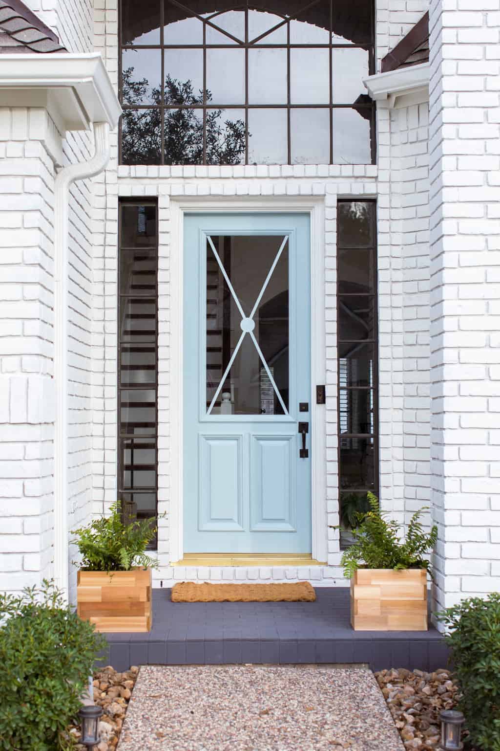 photo of an updated front porch and blue door