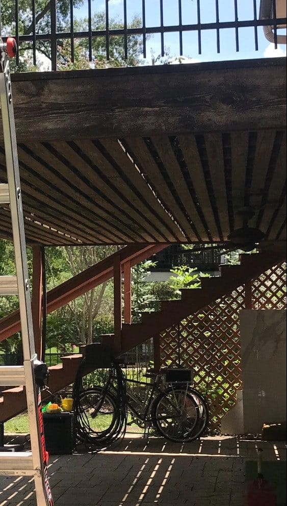 photo of an old patio under decking