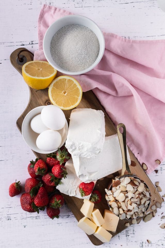 photo of all the ingredients needed to make keto strawberry cheesecake by top Houston lifestyle blogger Ashley Rose of Sugar & Cloth