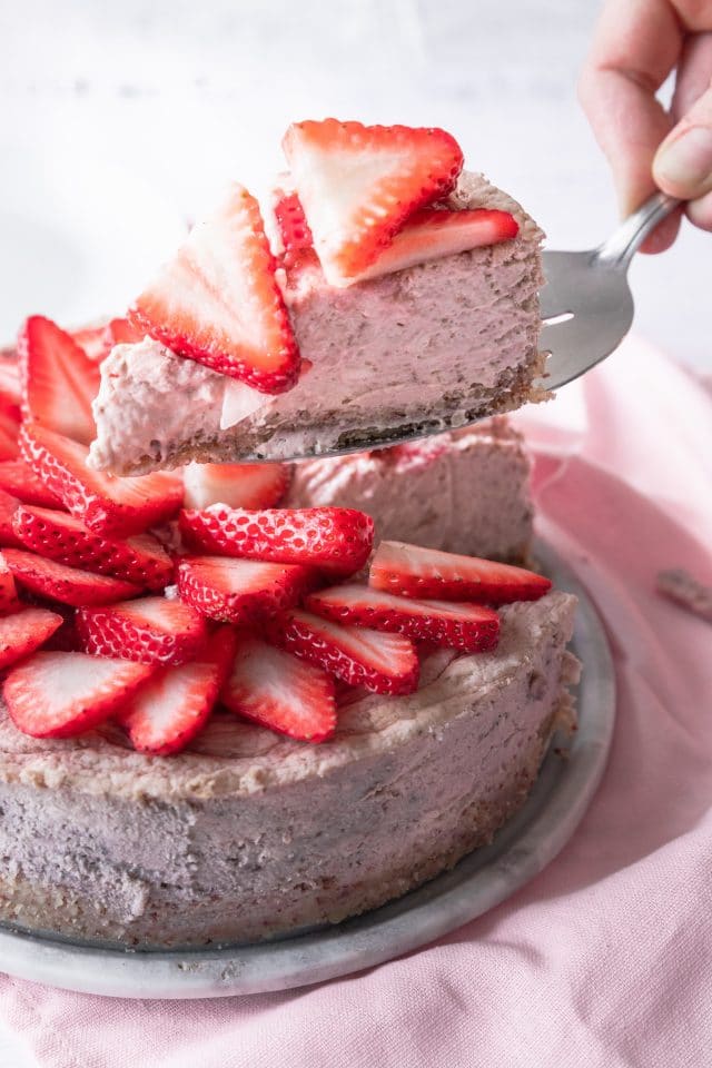photo of the Keto Strawberry Cheesecake being served by top Houston lifestyle blogger Ashley Rose of Sugar & Cloth