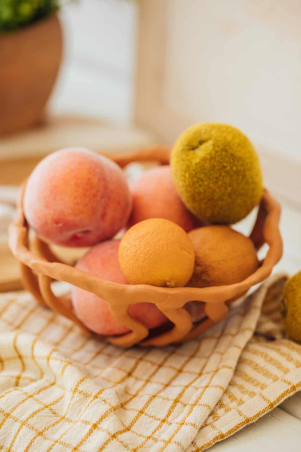 photo of a DIY Clay Fruit Bowl by top Houston lifestyle blogger Ashley Rose of Sugar & Cloth