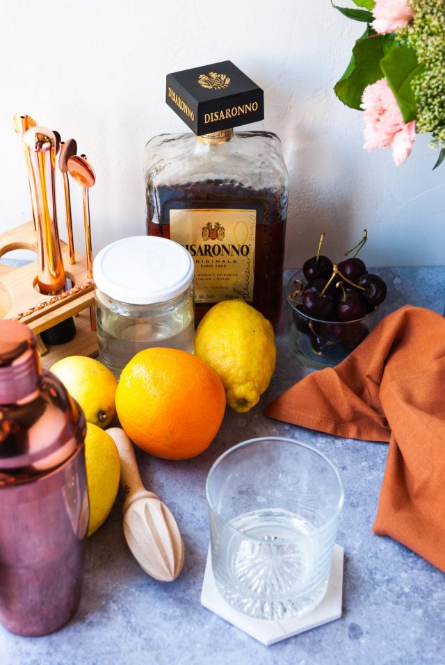 What's in an Amaretto Sour - A photo of all the tools and ingredients to make the drink.