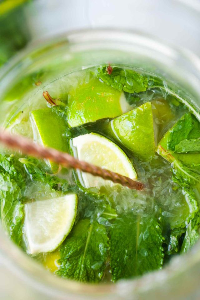 make a pitcher of mojitos - mixing all the ingredients inside the pitcher