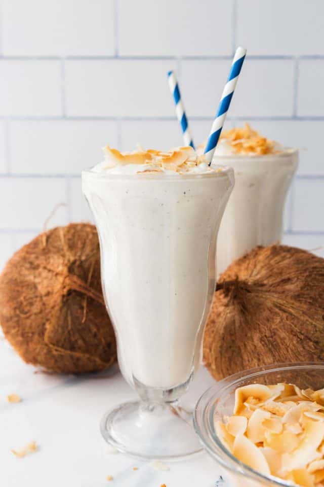 coconut shake - white drink with straws