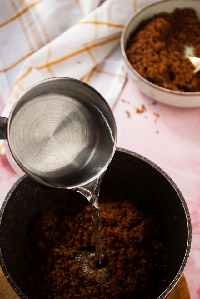 how to make brown sugar syrup - water liquid pouring down brown sugar