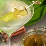 pickle juice drink - picked martini with a pickle garnish