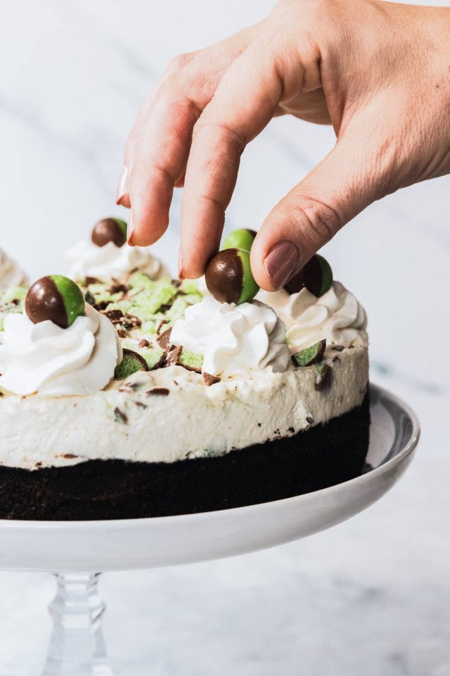 decorating the aero cheesecake - topping it with aero mint bubbles