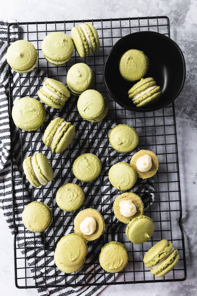 baked green tea macaron placed on a cooling rack