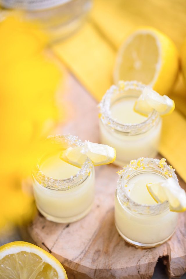 three shots of lemon drop shots - mixed shots with vodka by Ashley Rose of sugar & cloth