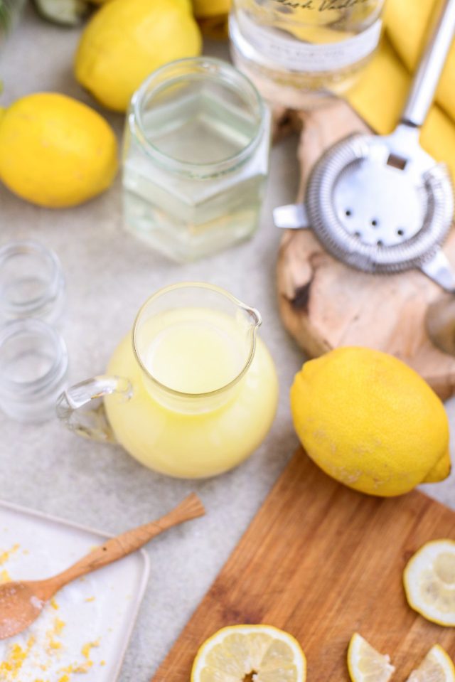 lemon juice in a pitcher - what's in a lemon drop shot by Ashley Rose of sugar & cloth
