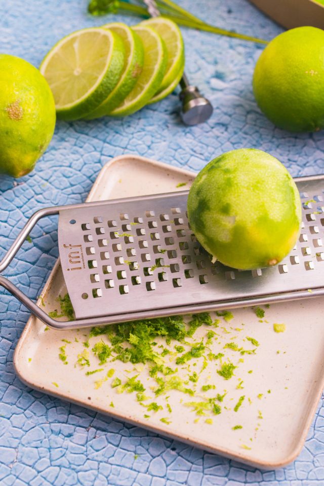 Grating the lime zest for the Key lime martini 