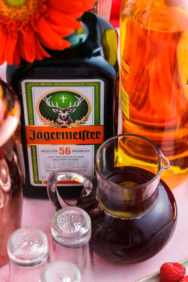 a bottle of Jägermeister and other ingredients