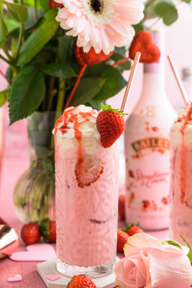 a glass of Baileys strawberries and cream pink mudslide