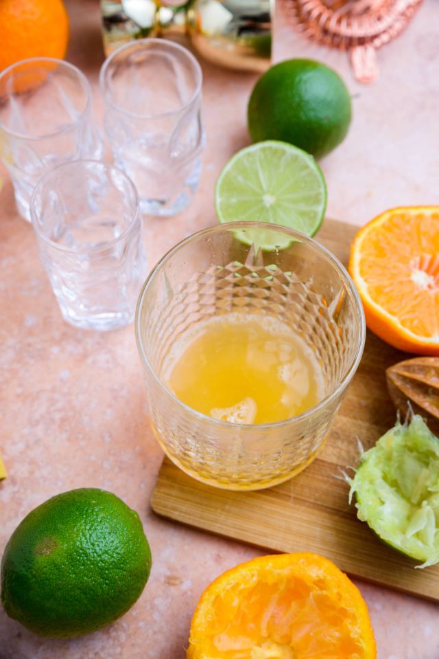 juicing the tangerines and limes for the Cactus cooler shot