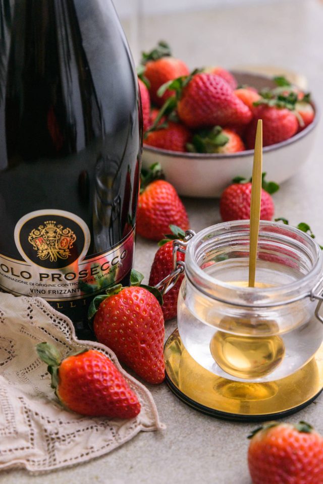 Prosecco, strawberries and simple syrup