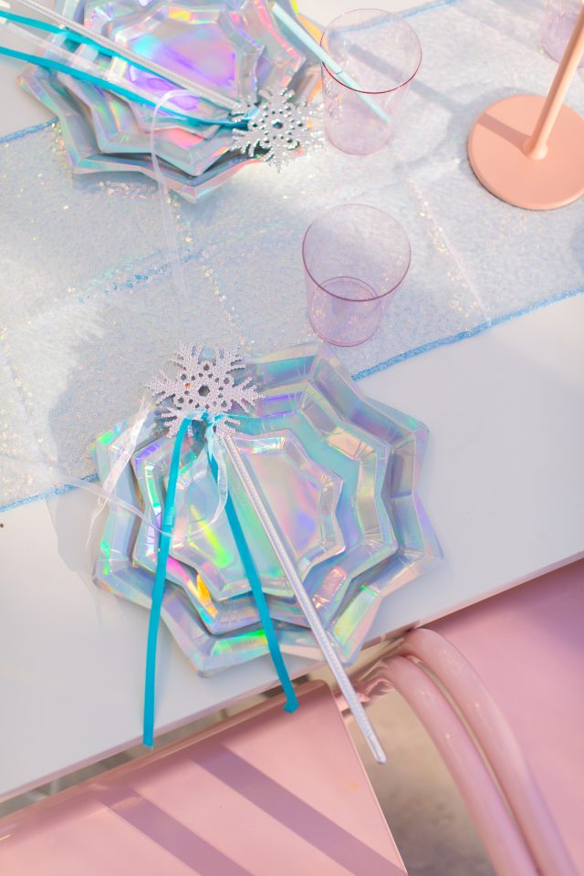 Snowflake iridescent Frozen birthday table decor for a DIY Frozen Birthday Party by Sugar & Cloth