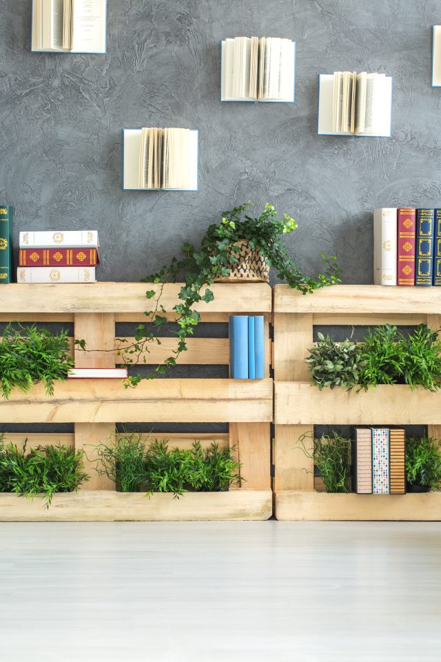 DIY creative inspiring bookshelf made of pallets in modern room