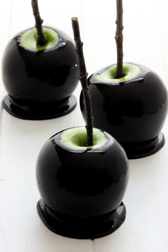 Spooky Black Caramel Apples for Halloween Desserts